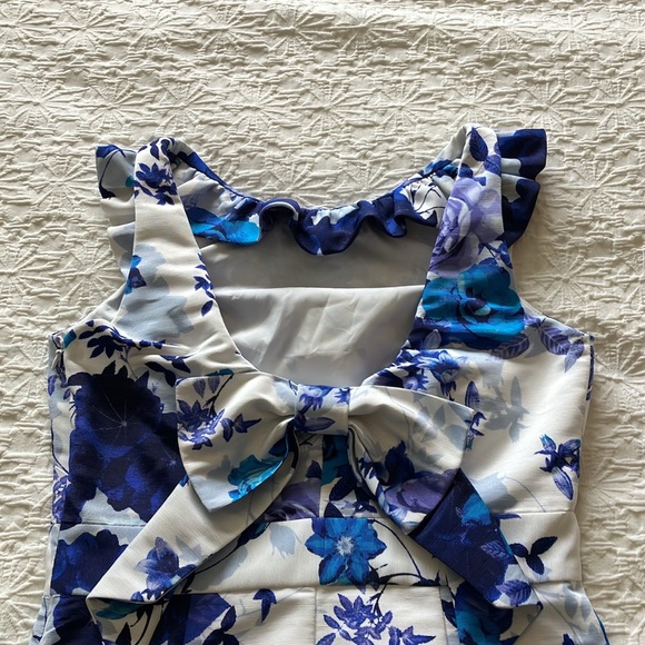 Gorgeous white w/shades of blue floral dress w/fun ruffle & fab back bow 🎀 - Picture 6 of 16